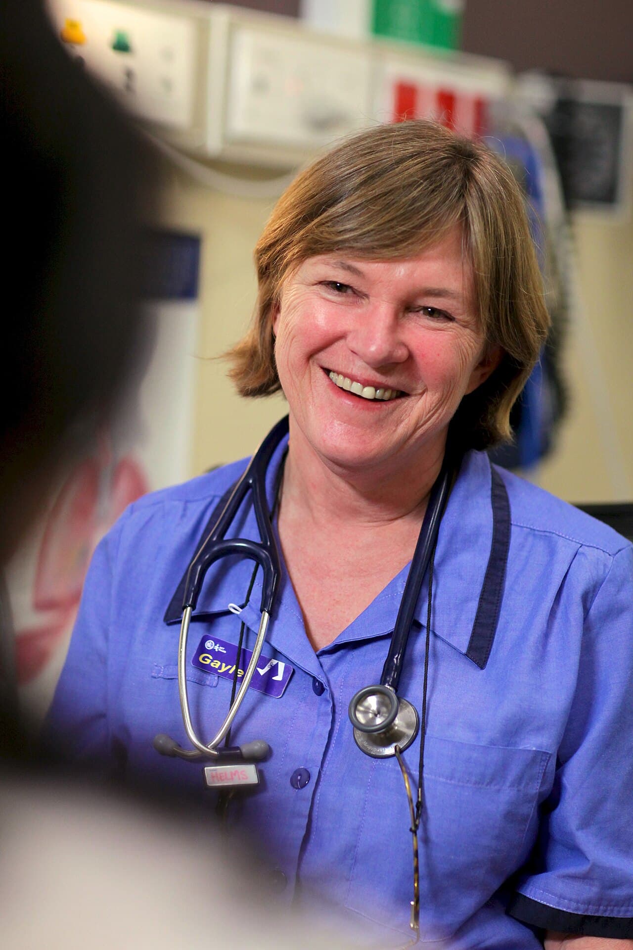 Slaugytoja bendrauja su pacientu klinikoje